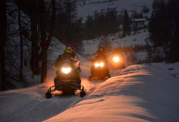 Snowmobile evening tour in Alta Val di Susa