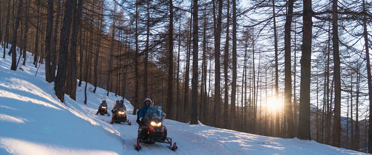 Aperitour in motoslitta in Alta Val di Susa al tramonto