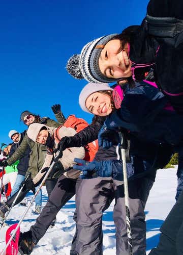 High-altitude snowshoeing on the Paganella in Andalo