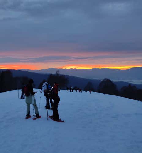 Sunset snowshoe hike on the Asiago Plateau with aperitif