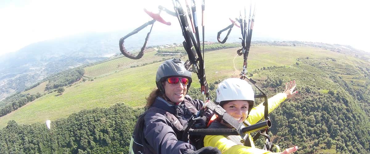 Tandem paragliding flight over the village of Stilo