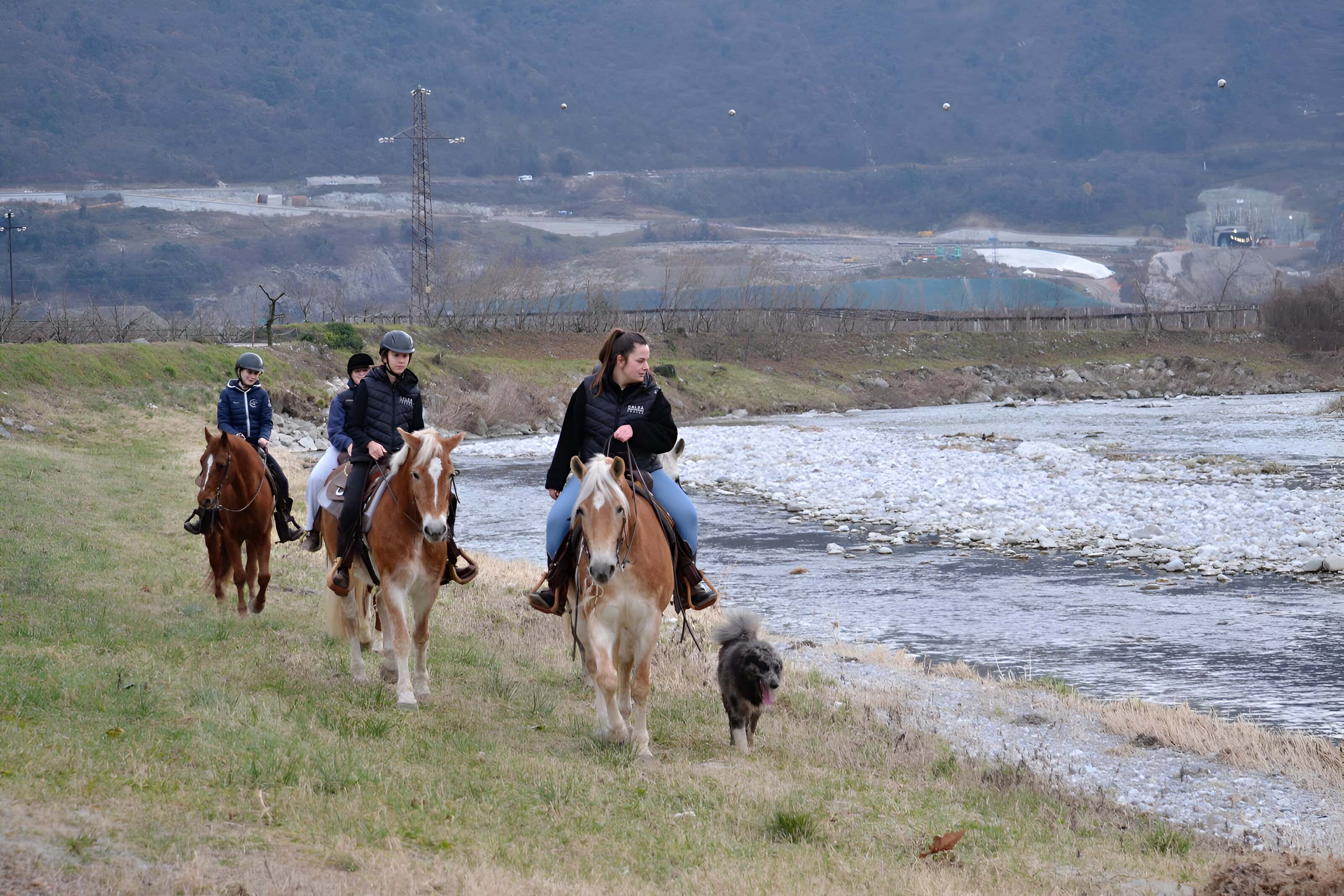 Horse riding along the Sarca River in Garda Trentino