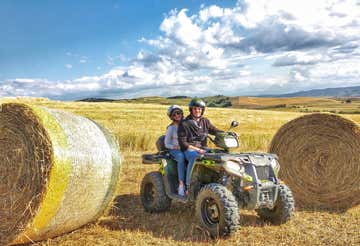 Quad bike tour and walk to the rock caves of Matera