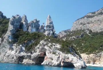 One-day motorboat excursion to the Baunei coastline