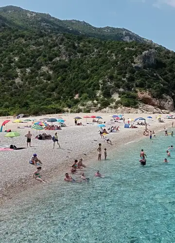 One-day motorboat excursion to the Baunei coastline