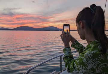 Boat tour in Alghero with an aperitif at sunset