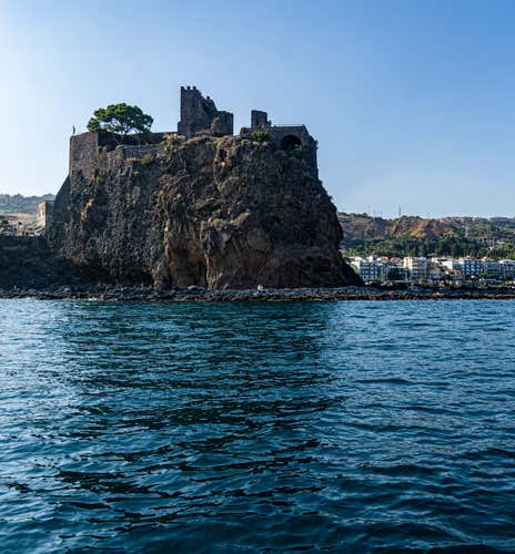 Dinghy excursion from Aci Trezza along the Riviera dei Ciclopi with toast