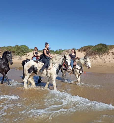 Horse riding on the beach at Santa Maria del Focallo