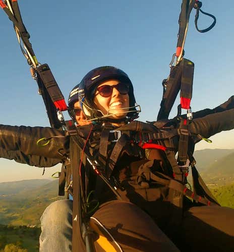 Tandem paragliding flight over the hills of Tivoli