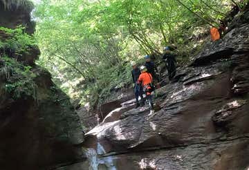 Canyoning sport in Val Maggiore in the Belluno Pre-Alps