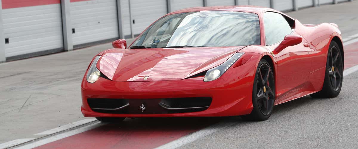 Sports driving in Ferrari at the Lombardore racetrack