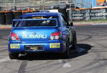Sports driving in Subaru Impreza WRC at Lombardore racetrack