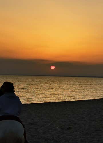 Horse riding on the beach at Lido Azzurro near Taranto