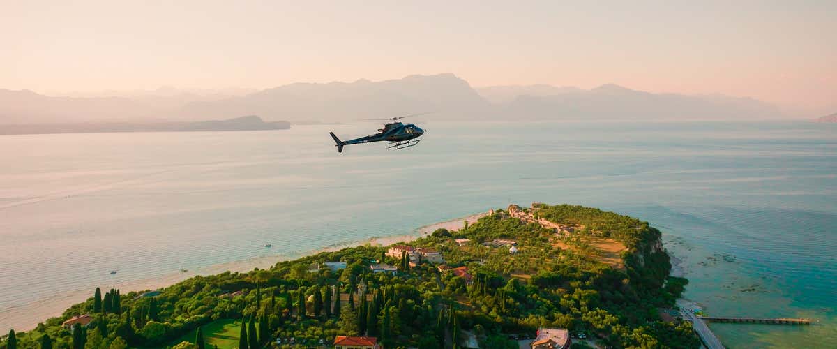 Panoramic helicopter flight over Lake Garda