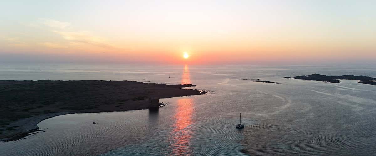Catamaran aperitif in the Asinara National Park at sunset
