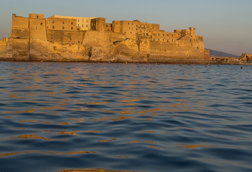 Boat tour along the coast of Naples and Posillipo at sunset