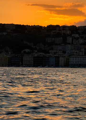 Boat tour along the coast of Naples and Posillipo at sunset