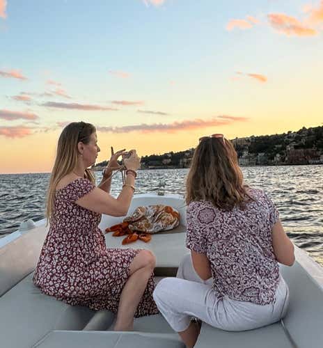 Boat tour along the coast of Naples and Posillipo at sunset