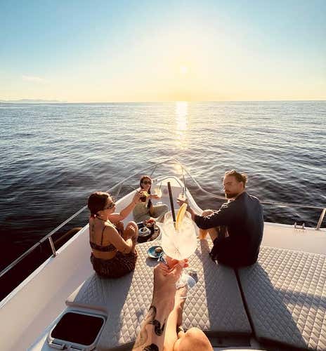 Catamaran tour at sunset on the Palermo coast and aperitif