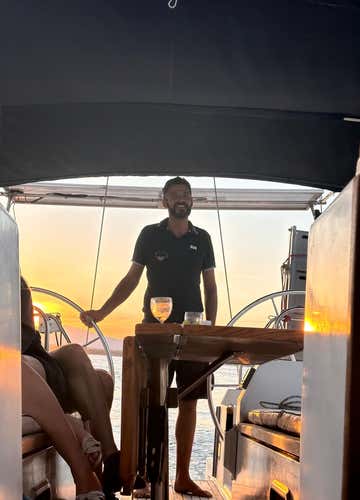 Sunset aperitif on a sailing boat in Alghero