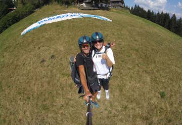 Tandem paragliding flight at Monte San Vigilio