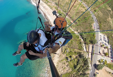 Tandem paragliding flight in Taormina and the Messina province
