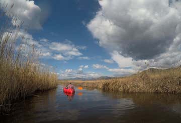 Packrafting at Lake Massaciuccoli in Tuscany and aperitifs
