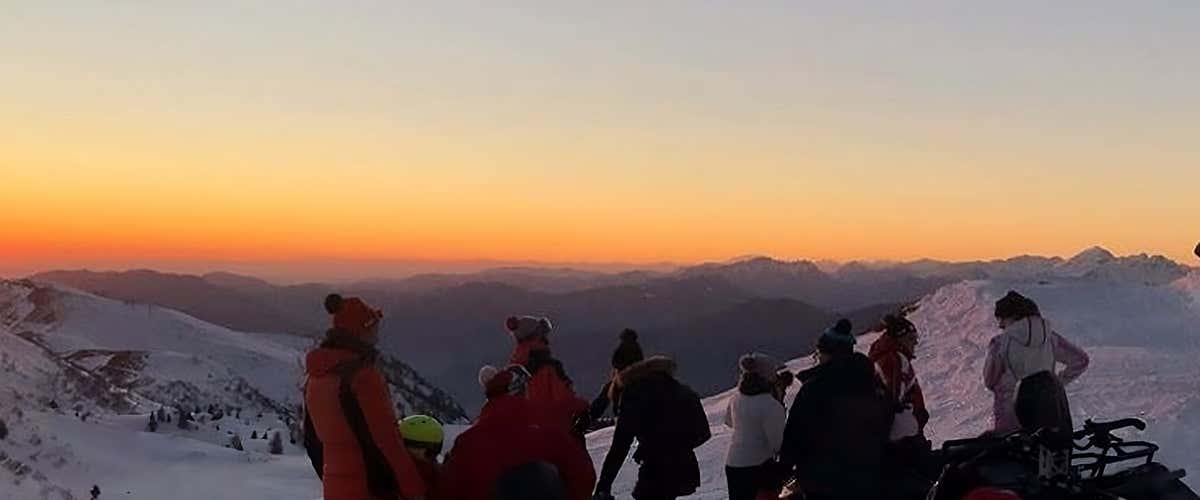 Giro in motoslitta e aperitivo con vista a Montecampione