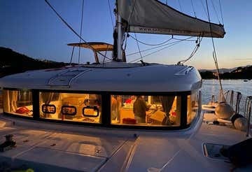 Night on a luxury catamaran in Porto Rafael