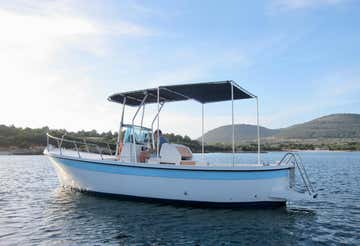 Half-day gozzo tour along the Alghero coast with toast