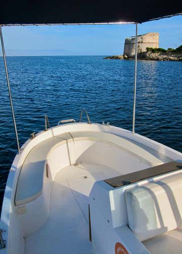 Half-day gozzo tour along the Alghero coast with toast