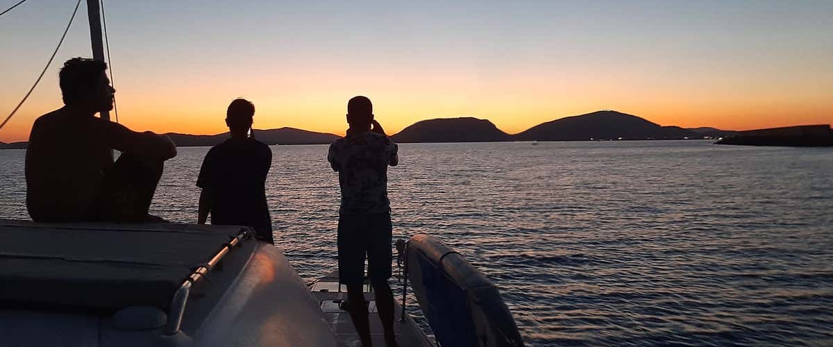 Catamaran sunset tour with aperitif in the Gulf of Alghero