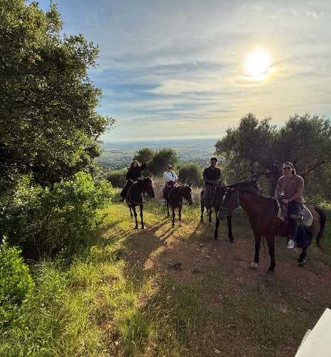 Horseback riding in the Tuscan Maremma with river bathing