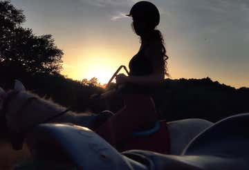 Horseback riding in the Castelli Romani Park at sunset