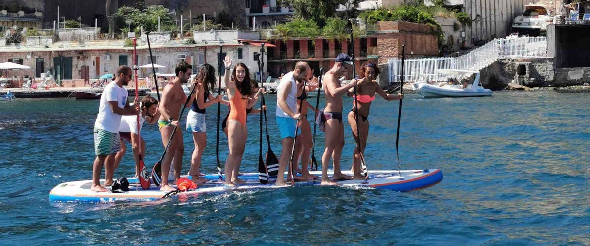 Giant SUP sunset provate tour with aperitif in Naples